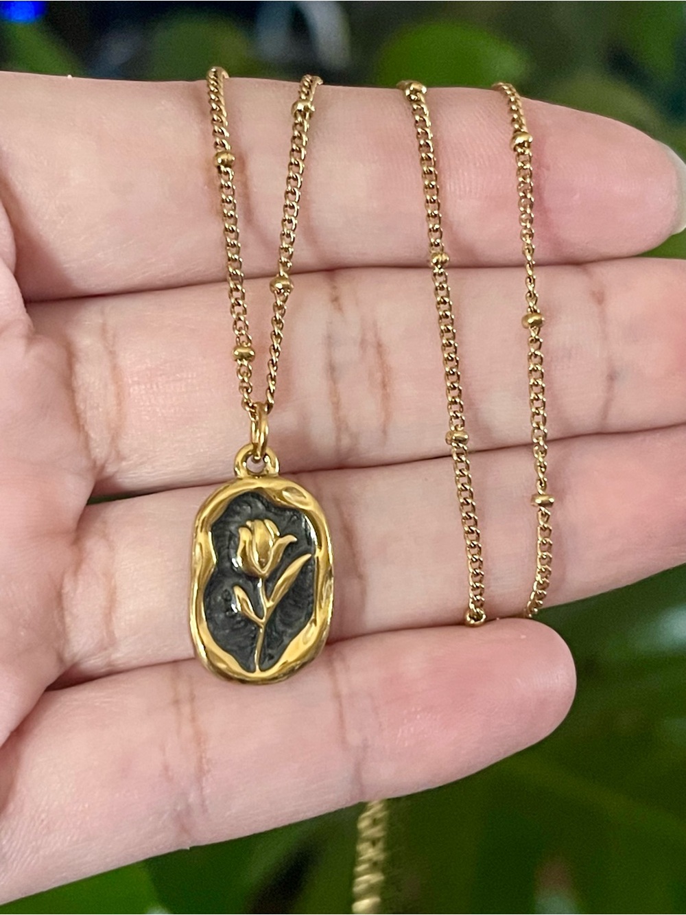 Floral Pendant Necklace in Gold and Black Finish